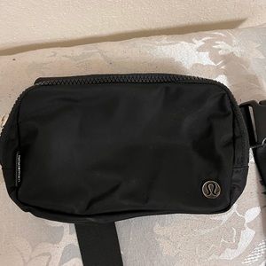 Small black Lulu Lemon crossbody/fanny pack